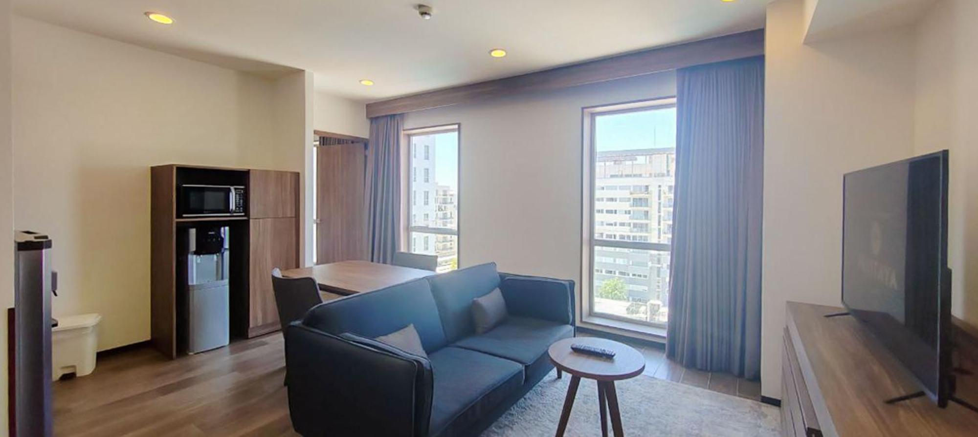 Fujitaya Queretaro Hotel Exterior photo A living room in a serviced apartment in Tokyo, Japan